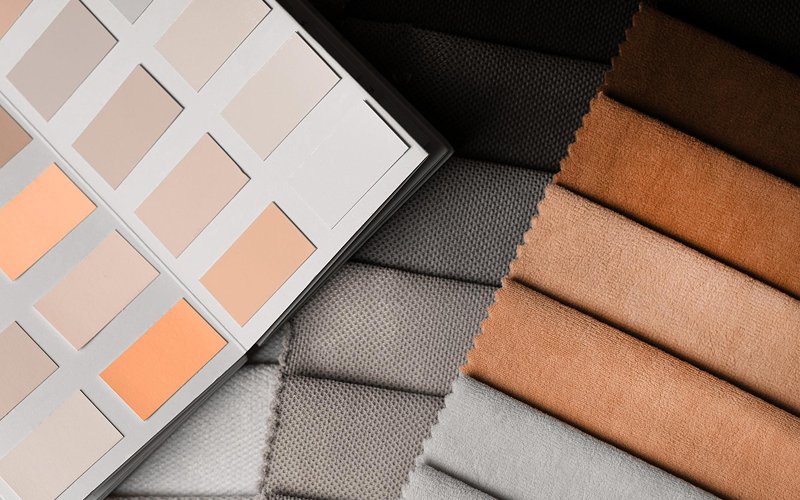 Color and fabric swatches for choosing safe sofa materials.